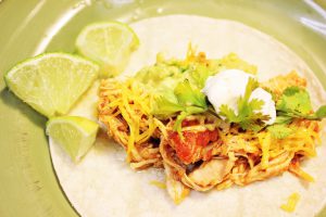 4-Ingredient Slow Cooker Chicken Tacos #recipe #taco #slowcooker #crockpot #easy #chickentaco #chickenthigh #budgetfriendly #budgetmeal